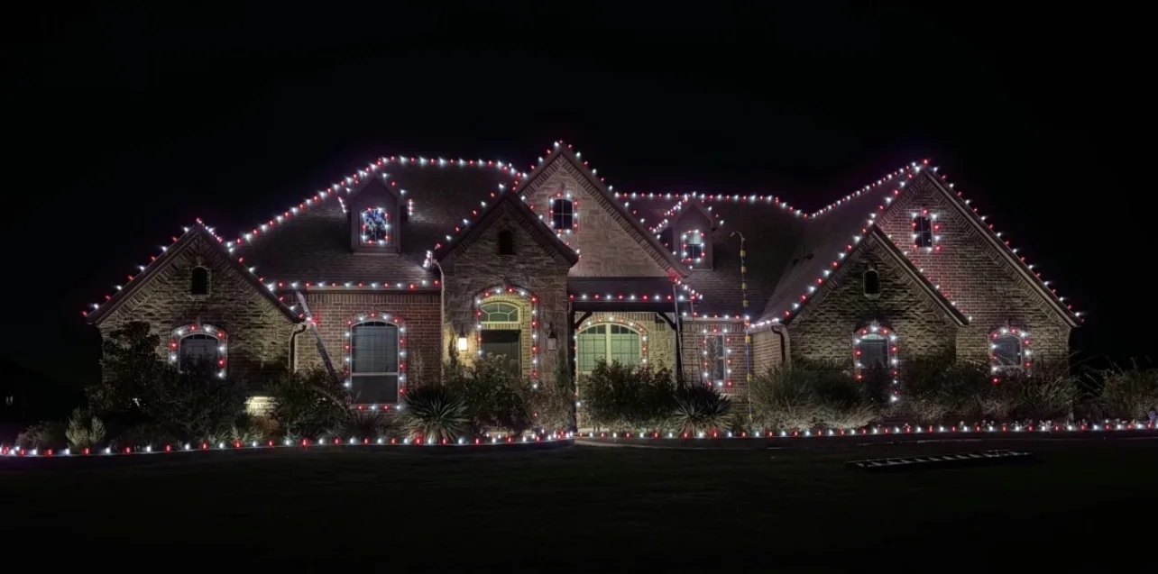 Red and white C9 across six rooflines and the bed edge